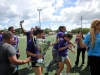 Equipo violeta celebrando su victoria