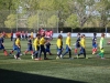 Equipos de Bayamón FC jugando un partido en España