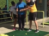 Acompañante y joven participante del 5to Festival de Golf de Educación Física Adaptada