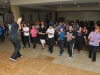 Participantes de Bayamón Ciudad Salsera aprendiendo a bailar
