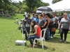 Visitantes apreciando el eclipse solar desde un telescopio