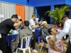 Booth de la Modern Hairstyling Institute ofreciendo recortes y peinados a visitantes de la actividad