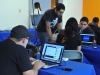 Participantes del evento IOT Village- Hacker Lab Series trabajando en sus programaciones