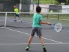 Niños participantes del evento jugando en cancha