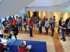 Nuevo personal de Selectos recibiendo orientacion en el lobby del Teatro Braulio Castillo