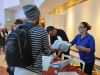 Nuevo personal de Selectos recibiendo orientacion en el lobby del Teatro Braulio Castillo