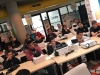 Jovenes tomando su curso de programación