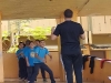 Lider junto a grupo de estudiantes partícipes del Taller de volleybal